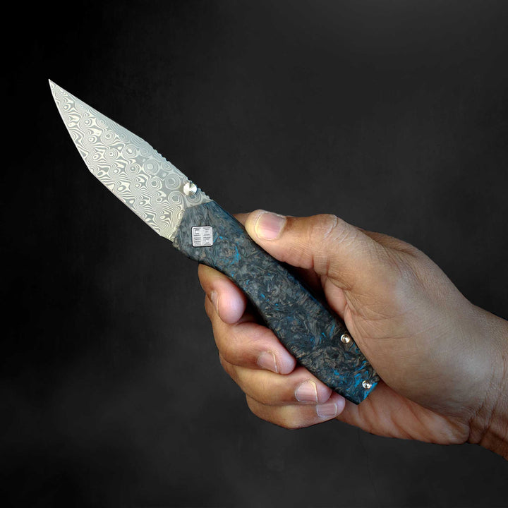 Delos Damascus knives Dark Matter Blue