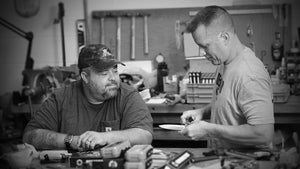Ocaso custom knifemakers Andrew Demko and Mike Wallace working on knife designs