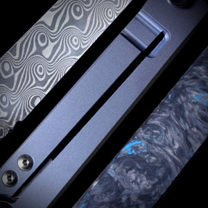 Damascus Anodized Titanium Frame Lock and Fat Carbon scales