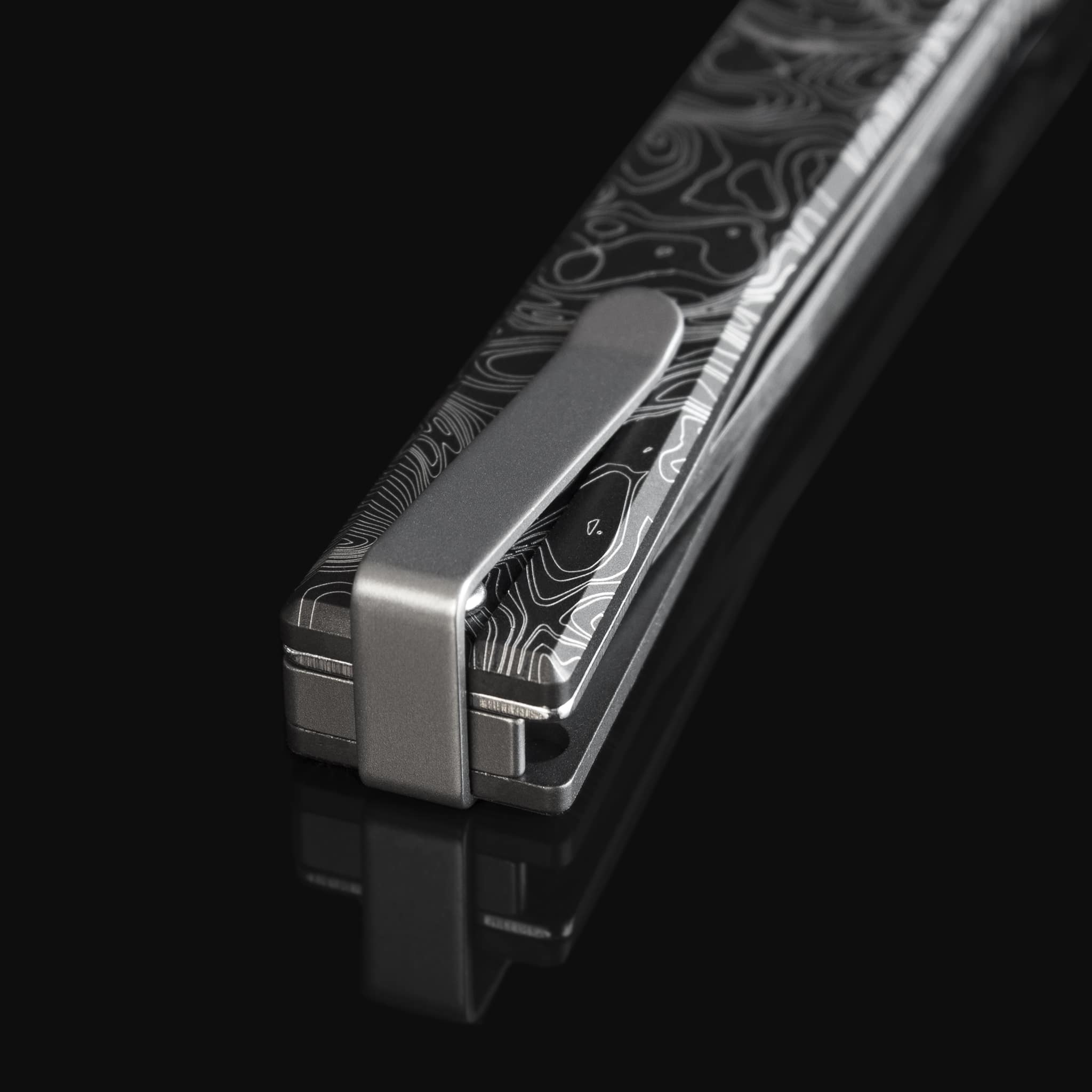 Titanium Solstice – Topo Engraved S35VN Gentleman's Knife | Ocaso