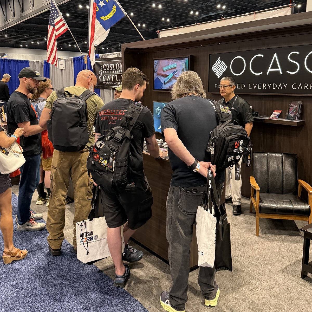 Image of people at Ocaso trade show booth